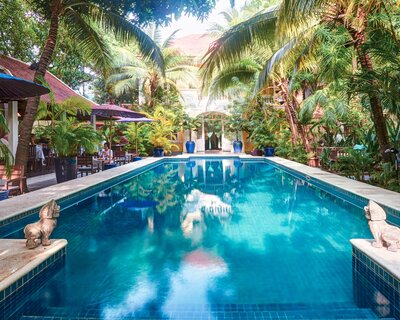 The pavilion hotel lush pool full length