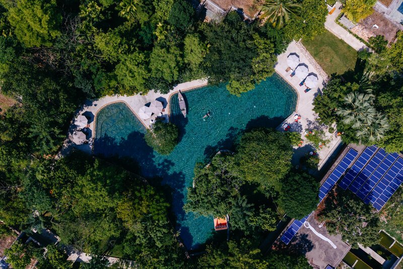 trees and large pool at Templation, Siem Reap.