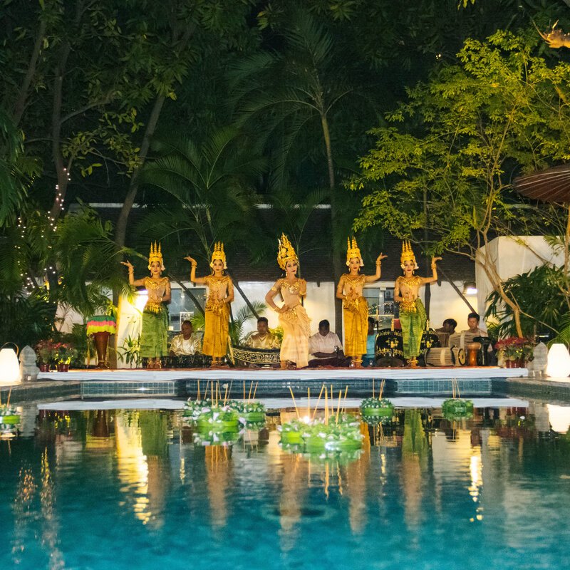 Floating lanterns and ritual blessing dance around Pavilion Hotel's pool.