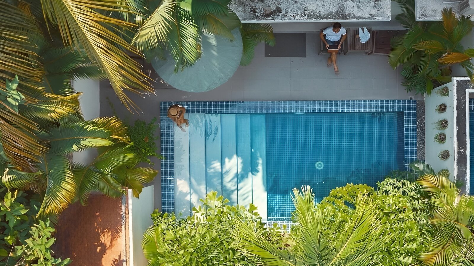 Aerial view of a Private Pool Room with its pool and tropical garden at Pavilion in Phnom Penh.