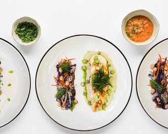 Three plated dishes presented as part of Pavilion's Culinary Art of Cambodia menu.