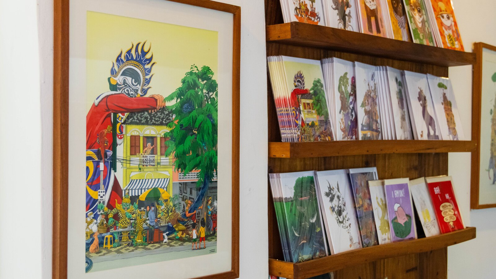 Illustrated cards featuring Cambodian-inspired artwork and architecture.