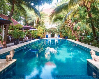 The pavilion hotel lush pool full length