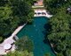 Main pool with boat and floating sala, Templation Angkor Resort, Siem Reap