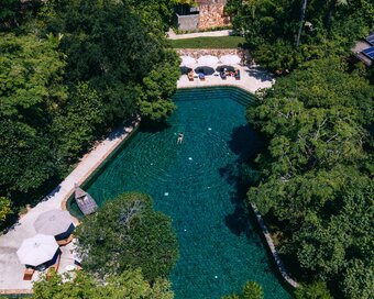 Main pool with boat and floating sala, Templation Angkor Resort, Siem Reap