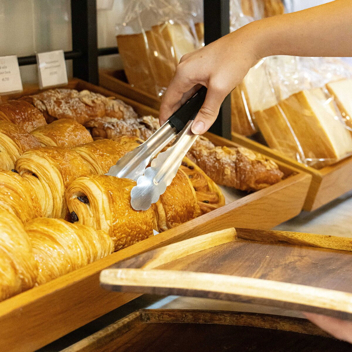 Picking a fresh pain au chocolat at Le Café, White Mansion Hotel, Phnom Penh