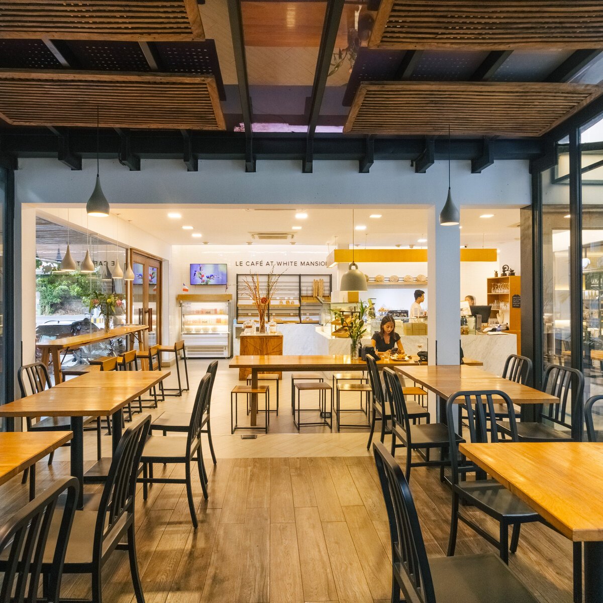 Looking through the seating section of Le Cafe dining area.